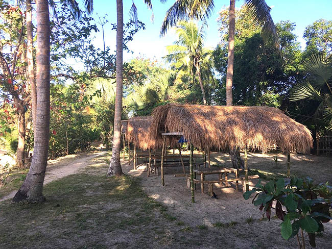 Beachfront Private Resort Near Lucena City Improvements include Caretaker Cottage, Rustic Pavilion, Beach shelters and BBQ, and a large Garage/warehouse with accommodation, all set on a well-maintained, fenced, and generally level property.