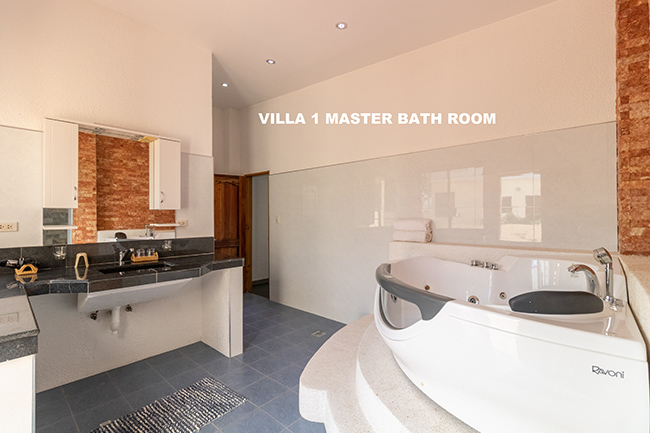 the master bathroom of the 1st villa