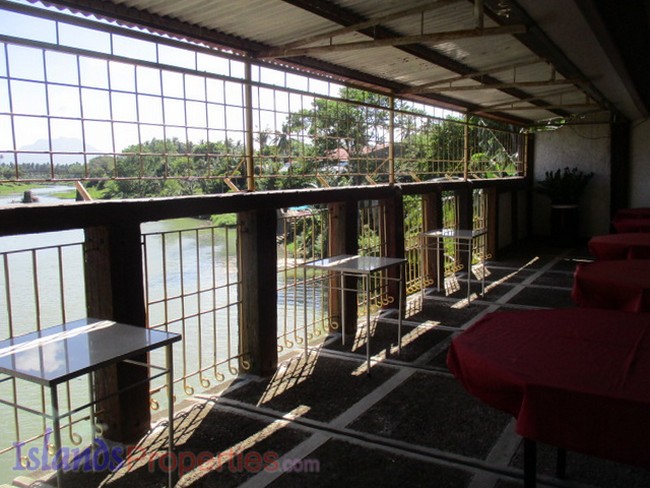 Riverside Resort for Sale view of the river terrace