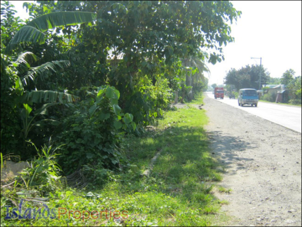 Commercial Lot for Sale This property is located along national highway and a few kilometers from the Malicboy Village Center,