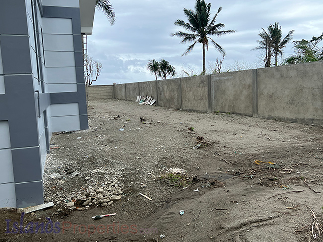 Brand New Beach Villa Near Boracay Outside the beachfront house, fenced
