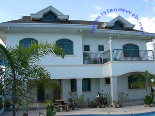 8 Bedroom Resort Style Home A 3 storey property with a large outdoor swimming pool, entertaiment area, and maid quarter.