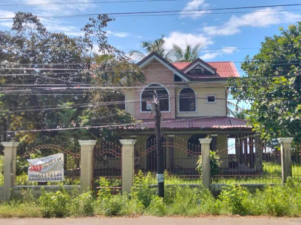 This is a 2-story unfinished house which is also a highway to a nearby beach lot. It has a wide and spacious lot area of about 2100 sq.m. more or less. The housing itself has a floor area of about 200 sq.m. This house has 4 bedrooms and 4 toilets and baths. It has a covered garage for 2 cars. This whole property is priced 18M pesos and located at Guihulngan ,Negros Oriental.